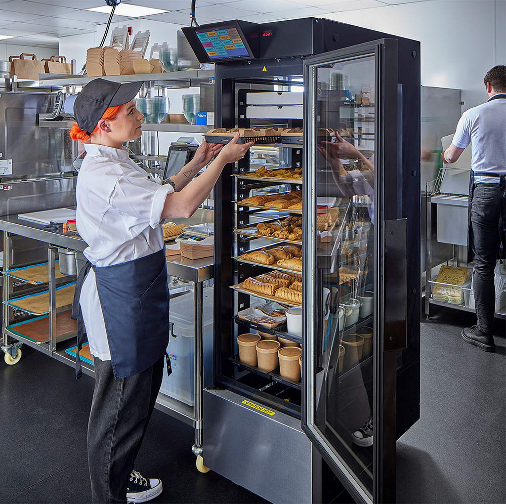 Kitchen team utilizing Flexeserve Hub high capacity hot-holding unit